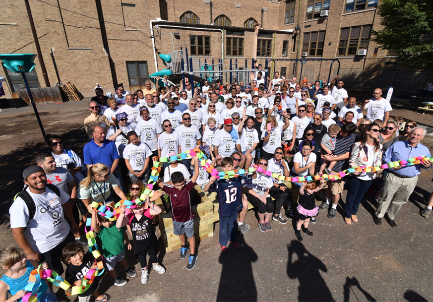 Large group of children pose for a group photo