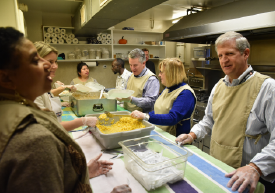 PSEG Employee Volunteers preparing a meal at St. John's Church